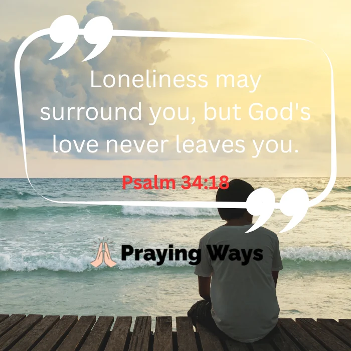 n image quote featuring Psalm 34:18 that reads, 'Loneliness may surround you, but God's love never leaves you.' The background shows a person sitting on a wooden dock looking out at a calm ocean under a cloudy sky