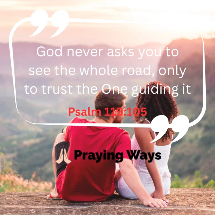An inspirational quote image featuring a couple sitting on a scenic hill, looking out at a valley view. The text overlay reads, "God never asks you to see the whole road, only to trust the One guiding it," referencing Psalm 119:105