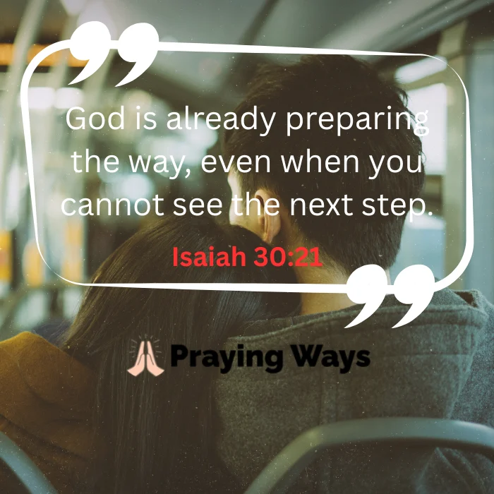 A heartfelt image of a woman resting her head on a man's shoulder while sitting on a bus or train. The text overlay states, "God is already preparing the way, even when you cannot see the next step," citing Isaiah 30:21