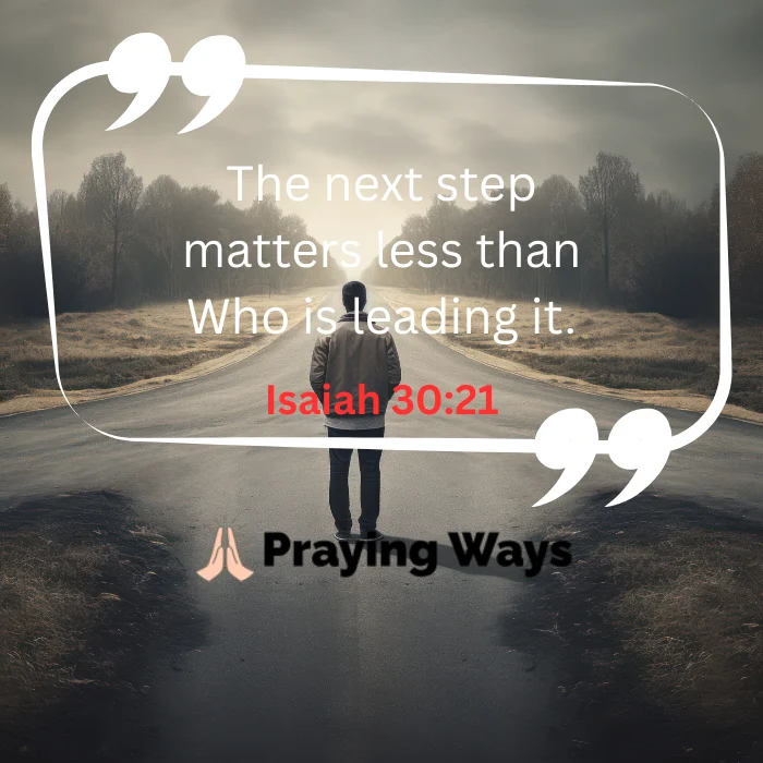 An inspirational quote graphic with text that reads "The next step matters less than Who is leading it. Isaiah 30:21" inside a white quote box. The background shows a man from behind, standing at a crossroads on an asphalt road surrounded by trees under an overcast sky